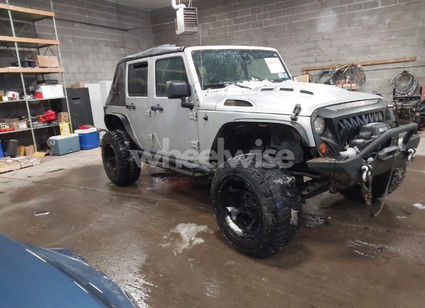 2011 Jeep Wrangler UNLIMITED SAHARA (VIN 1J4BA5H14BL593258) main photo