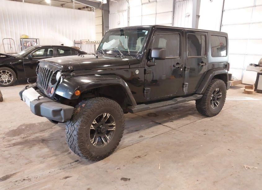 Photo 2 of 2011 Jeep Wrangler UNLIMITED SAHARA (VIN 1J4BA5H17BL633574)