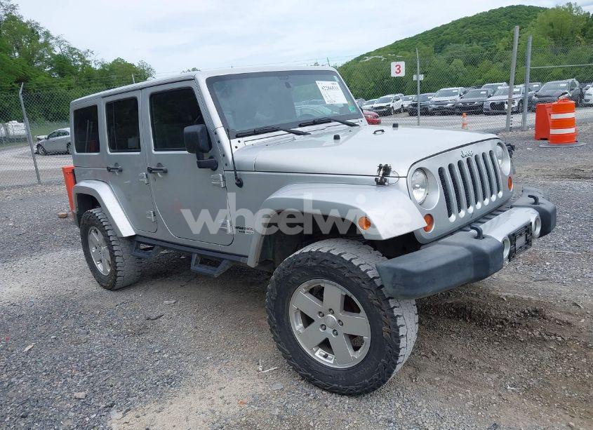 2011 Jeep Wrangler UNLIMITED SAHARA (VIN 1J4BA5H19BL506812) main photo