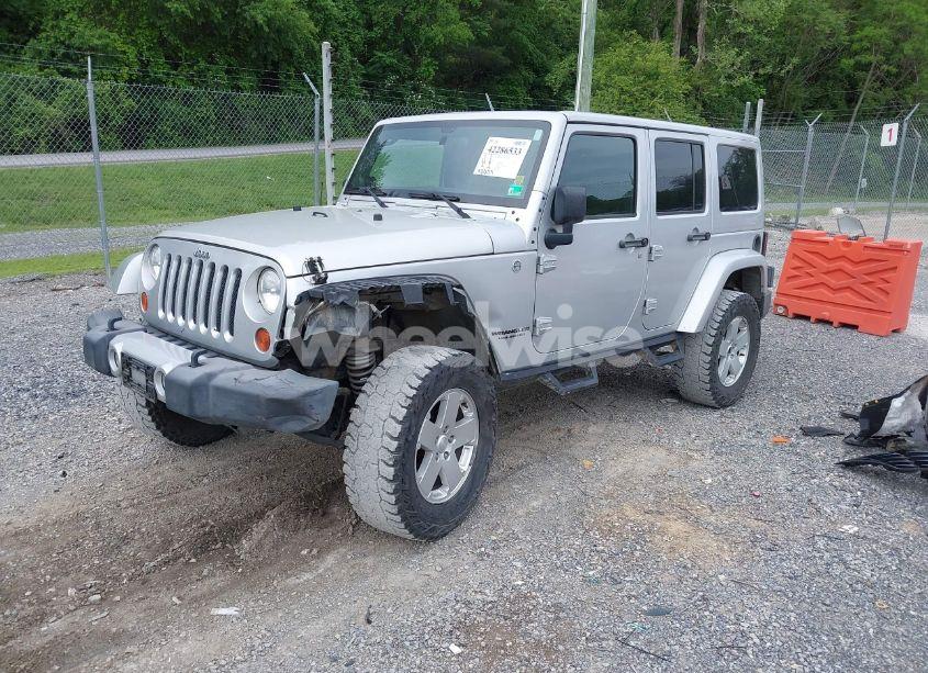 Photo 2 of 2011 Jeep Wrangler UNLIMITED SAHARA (VIN 1J4BA5H19BL506812)