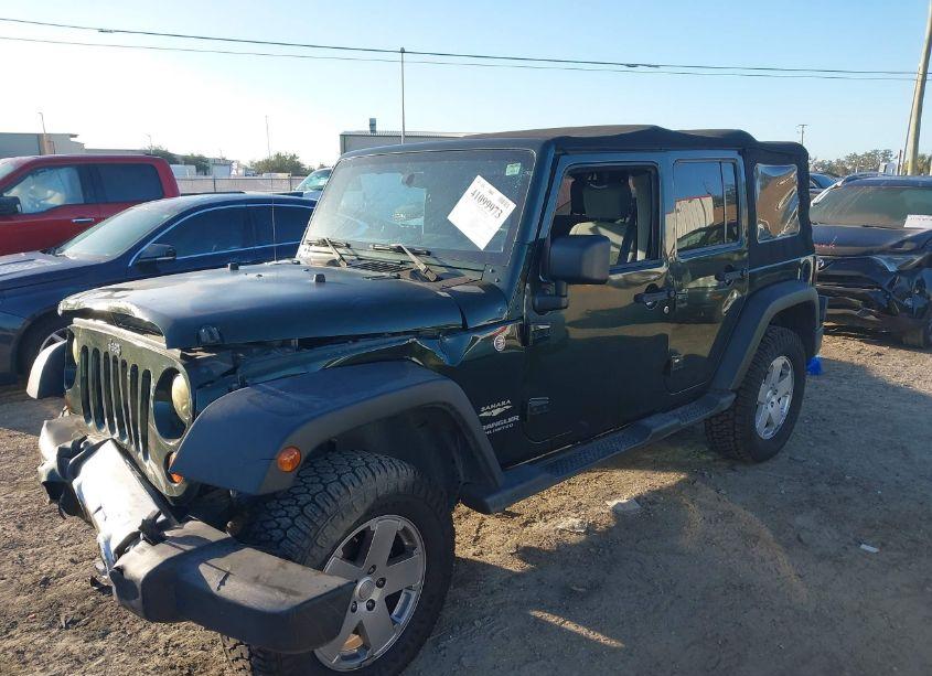 Photo 2 of 2010 Jeep Wrangler UNLIMITED SAHARA (VIN 1J4BA5H1XAL231806)