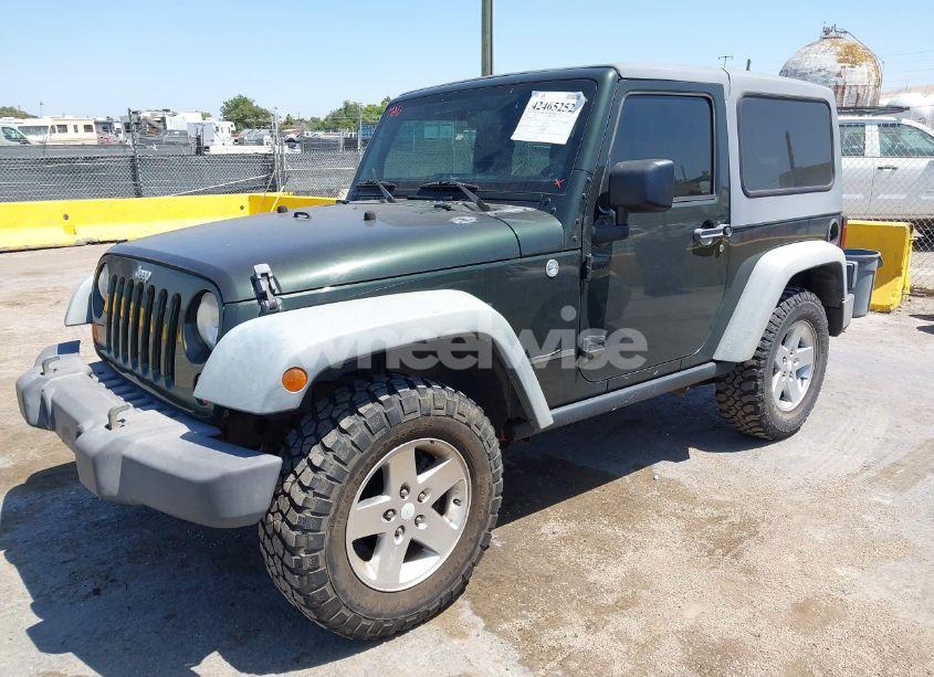 Photo 2 of 2011 Jeep Wrangler RUBICON (VIN 1J4BA6D11BL556342)
