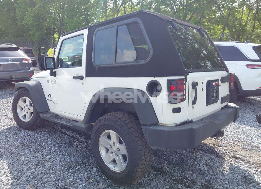 Photo 3 of 2009 Jeep Wrangler X (VIN 1J4FA24119L727658)