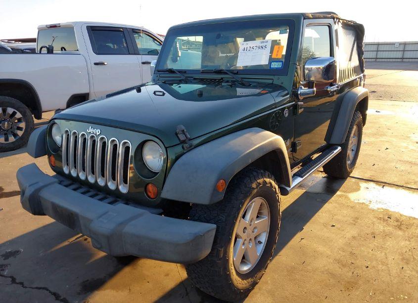 Photo 2 of 2009 Jeep Wrangler X (VIN 1J4FA24139L702938)