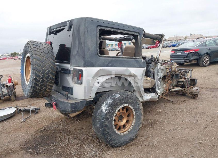 Photo 4 of 2009 Jeep Wrangler X (VIN 1J4FA24149L775557)