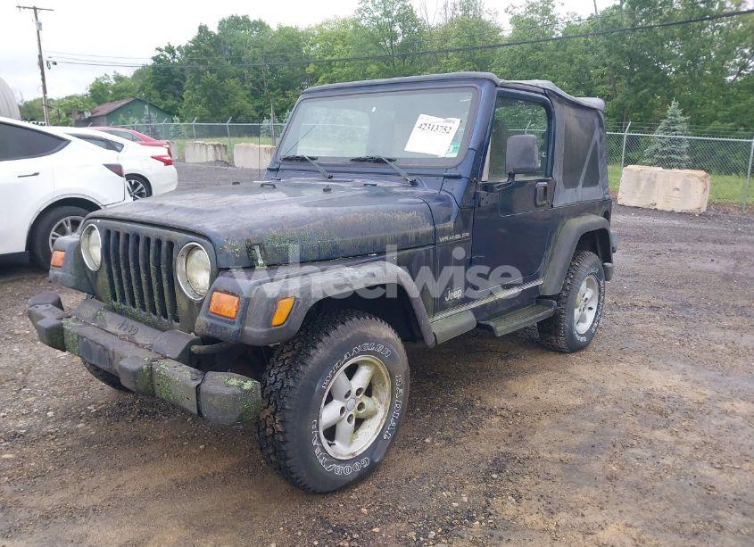 Photo 2 of 2000 Jeep Wrangler SE (VIN 1J4FA29P6YP777153)