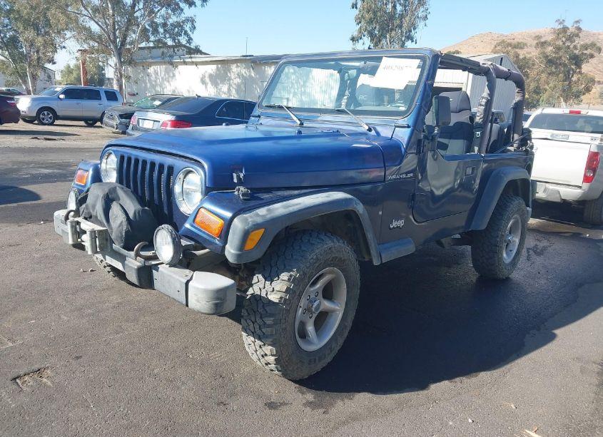 Photo 2 of 2000 Jeep Wrangler SE (VIN 1J4FA29P7YP802707)