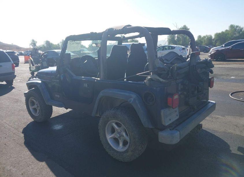 Photo 3 of 2000 Jeep Wrangler SE (VIN 1J4FA29P7YP802707)