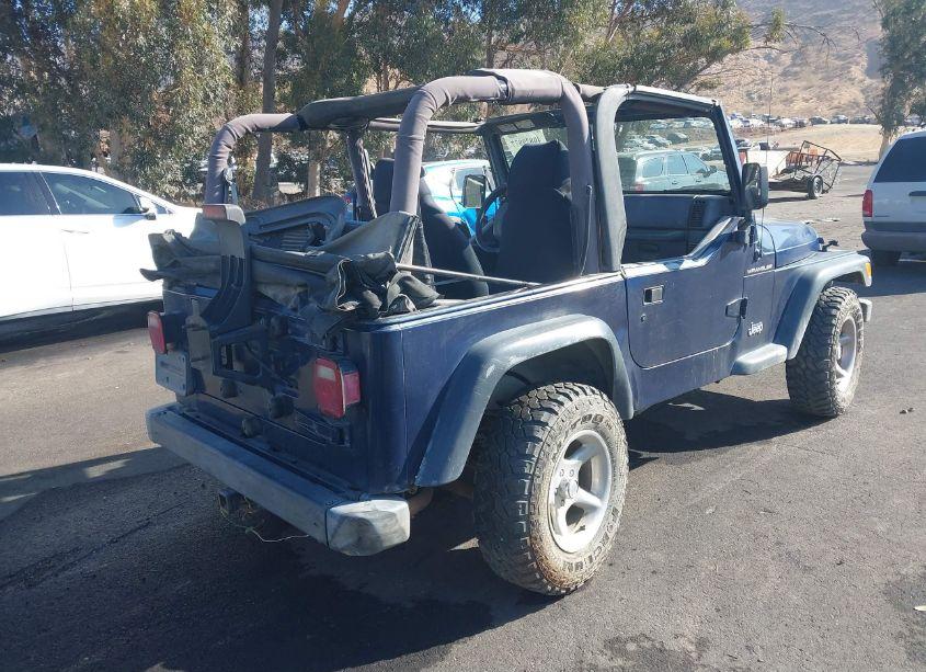Photo 4 of 2000 Jeep Wrangler SE (VIN 1J4FA29P7YP802707)