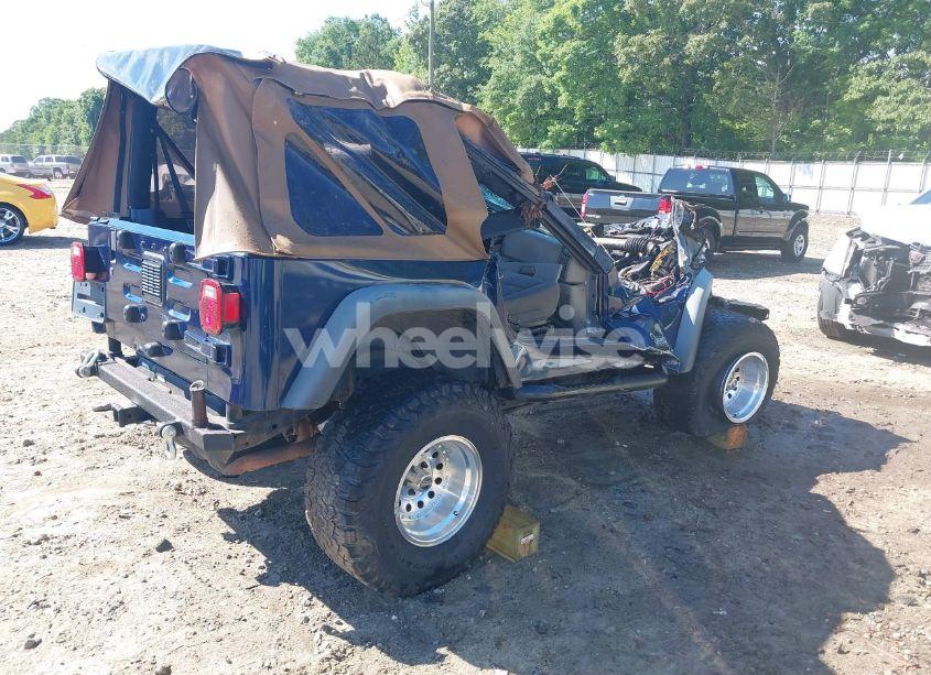 Photo 4 of 2003 Jeep Wrangler X (VIN 1J4FA39SX3P314337)