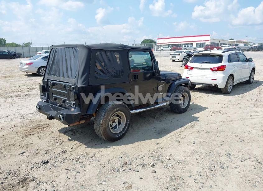 Photo 4 of 2002 Jeep Wrangler SPORT (VIN 1J4FA49S32P700831)