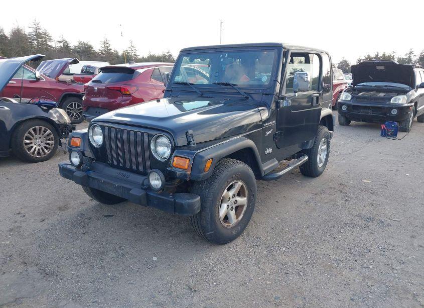 Photo 2 of 2002 Jeep Wrangler SPORT (VIN 1J4FA49S42P771214)