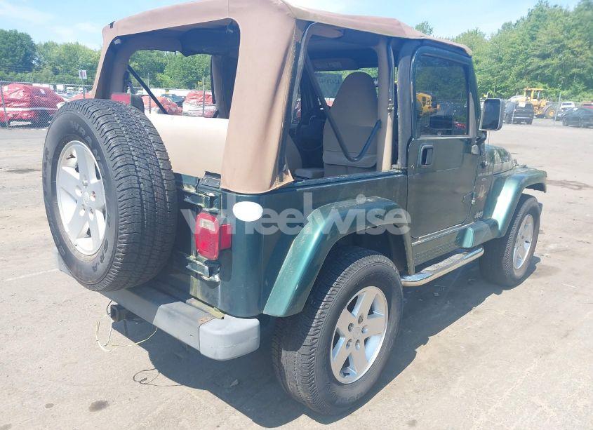 Photo 4 of 2000 Jeep Wrangler SAHARA (VIN 1J4FA59S0YP748057)