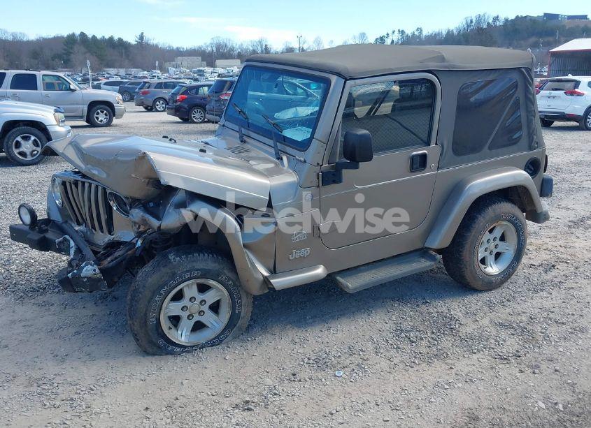 Photo 2 of 2004 Jeep Wrangler SAHARA (VIN 1J4FA59S94P770777)