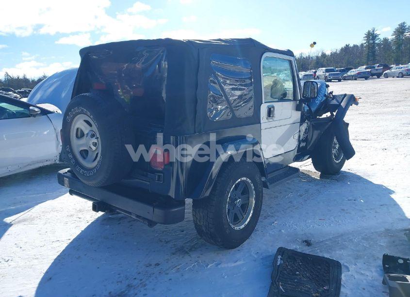 Photo 4 of 2003 Jeep Wrangler SAHARA (VIN 1J4FA59SX3P314995)