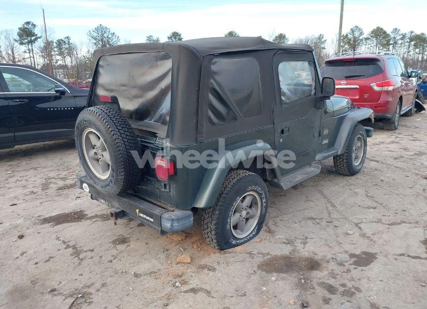 Photo 4 of 2003 Jeep Wrangler SAHARA (VIN 1J4FA59SX3P344031)
