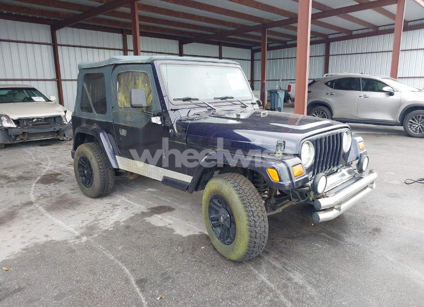 1999 Jeep Wrangler SPORT (VIN 1J4FY19S1XP402974) main photo
