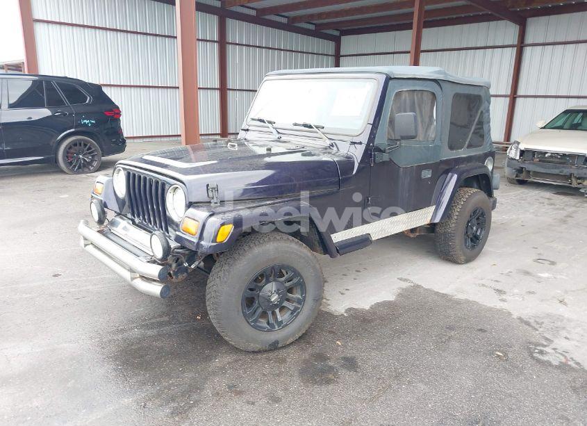 Photo 2 of 1999 Jeep Wrangler SPORT (VIN 1J4FY19S1XP402974)