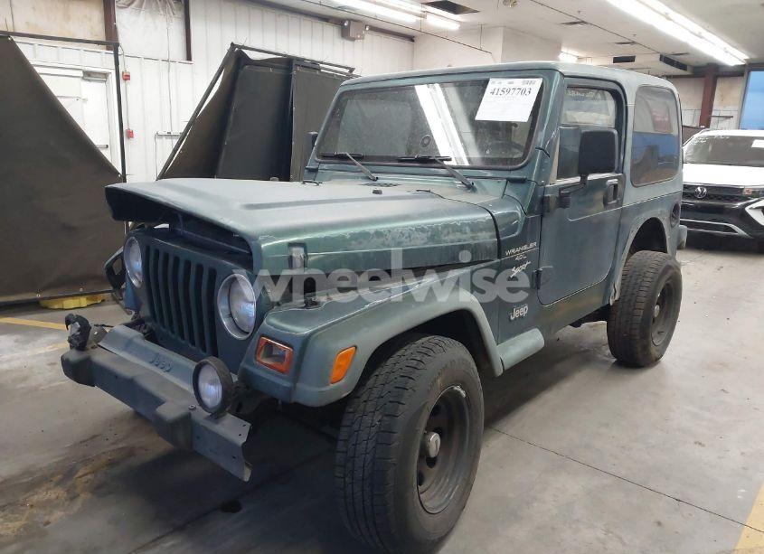 Photo 2 of 1999 Jeep Wrangler SPORT (VIN 1J4FY19S2XP470023)