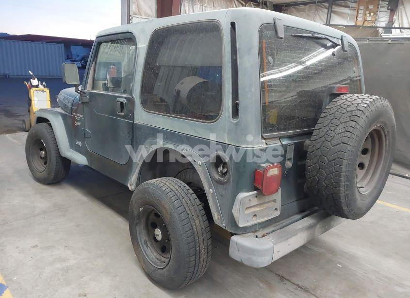 Photo 3 of 1999 Jeep Wrangler SPORT (VIN 1J4FY19S2XP470023)