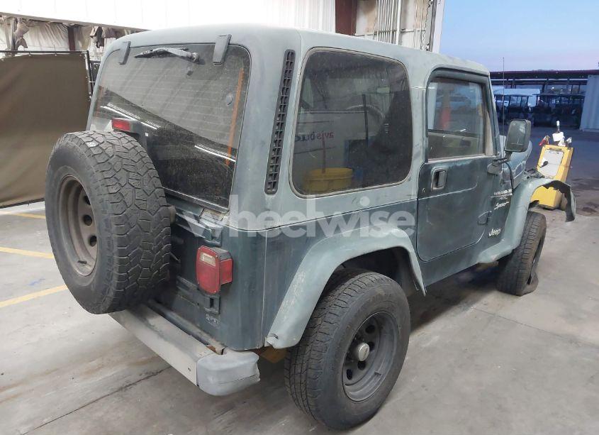 Photo 4 of 1999 Jeep Wrangler SPORT (VIN 1J4FY19S2XP470023)