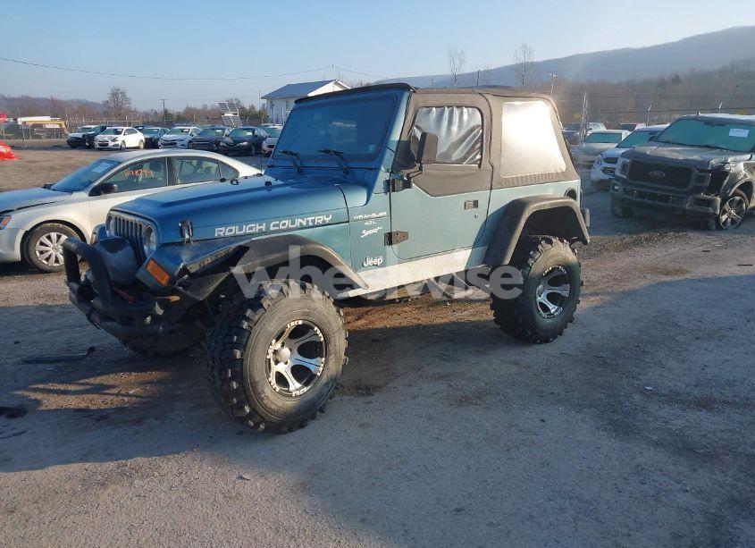 Photo 2 of 1999 Jeep Wrangler / TJ SPORT (VIN 1J4FY19S3XP433305)