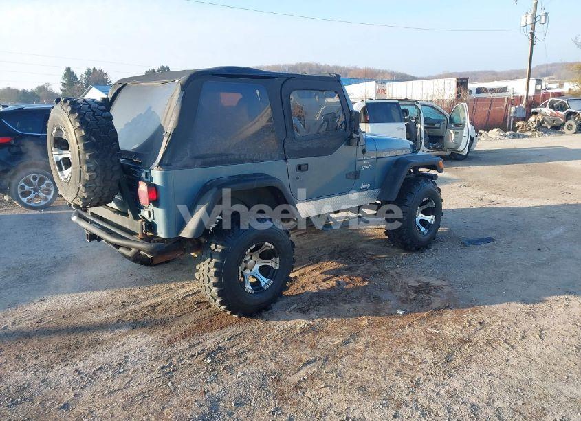 Photo 4 of 1999 Jeep Wrangler / TJ SPORT (VIN 1J4FY19S3XP433305)