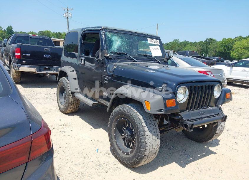 1999 Jeep Wrangler SPORT (VIN 1J4FY19S9XP423684) main photo
