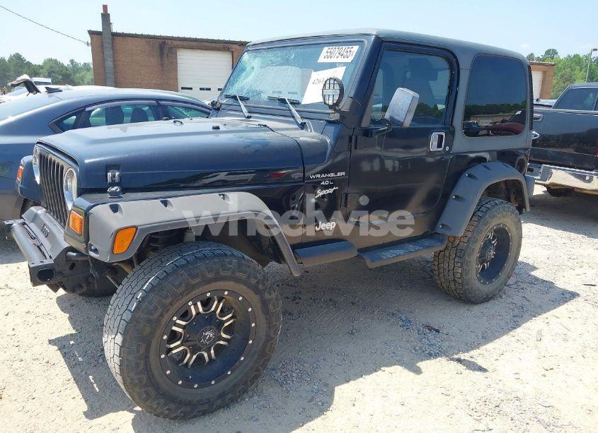 Photo 2 of 1999 Jeep Wrangler SPORT (VIN 1J4FY19S9XP423684)