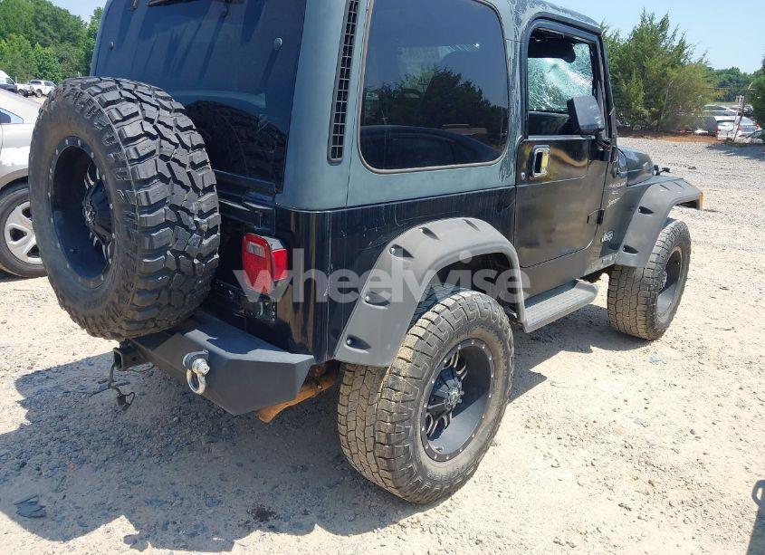 Photo 4 of 1999 Jeep Wrangler SPORT (VIN 1J4FY19S9XP423684)