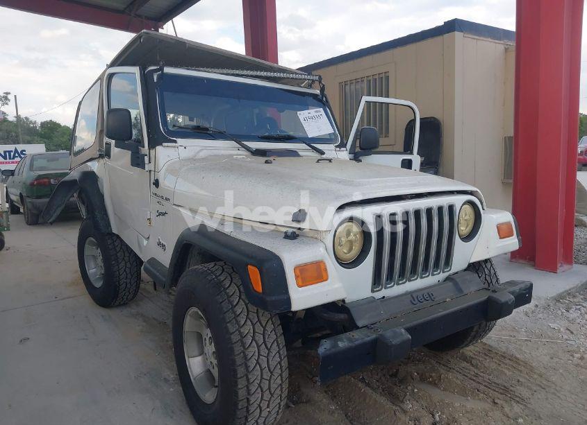 1999 Jeep Wrangler SPORT (VIN 1J4FY19S9XP471458) main photo