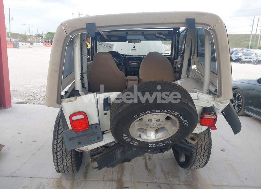 Photo 16 of 1999 Jeep Wrangler SPORT (VIN 1J4FY19S9XP471458)