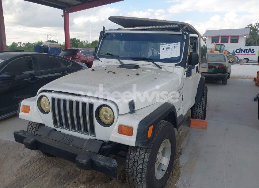 Photo 2 of 1999 Jeep Wrangler SPORT (VIN 1J4FY19S9XP471458)