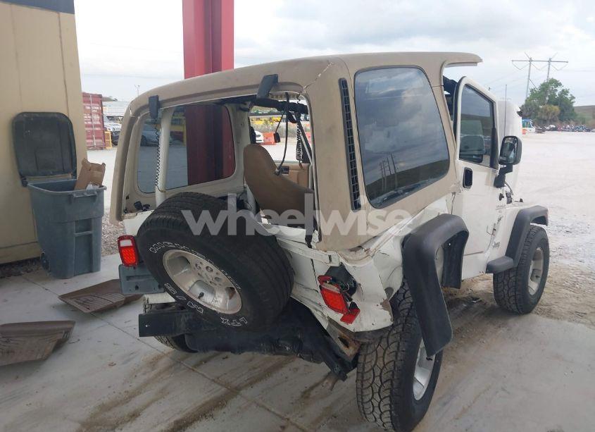 Photo 4 of 1999 Jeep Wrangler SPORT (VIN 1J4FY19S9XP471458)