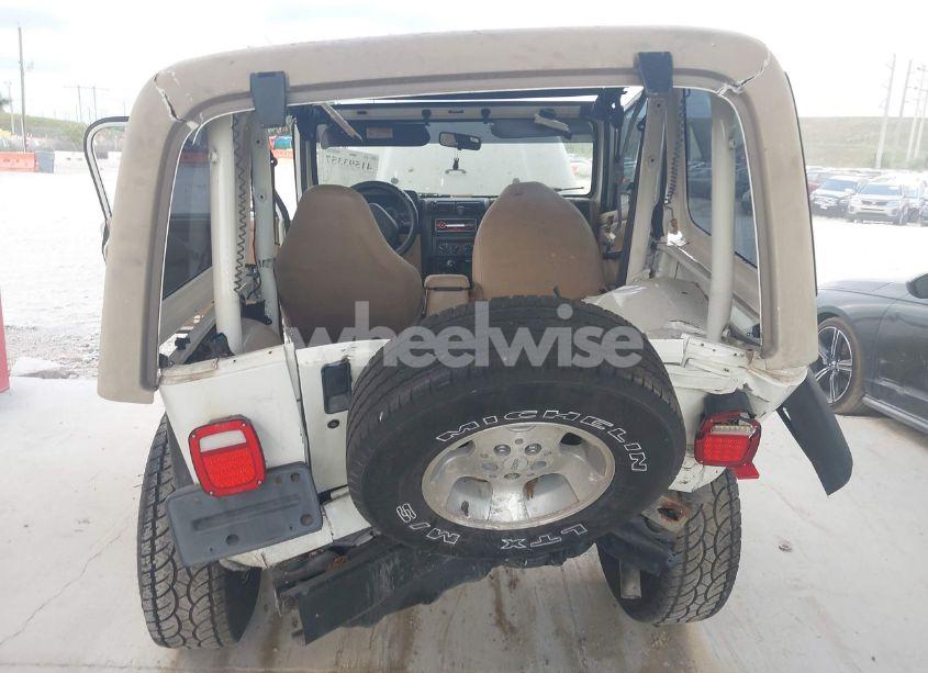 Photo 6 of 1999 Jeep Wrangler SPORT (VIN 1J4FY19S9XP471458)