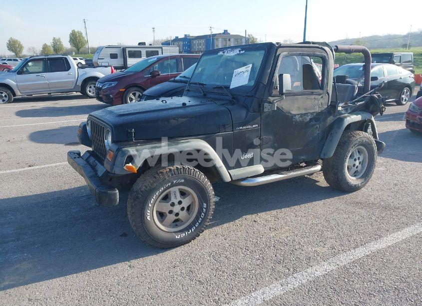 Photo 2 of 1997 Jeep Wrangler SE (VIN 1J4FY29P1VP449548)