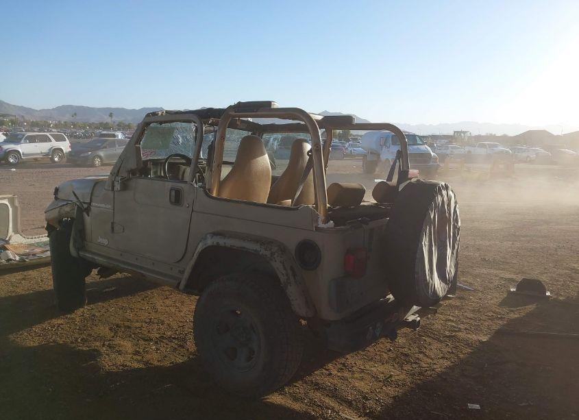 Photo 3 of 1999 Jeep Wrangler SE (VIN 1J4FY29P3XP422404)