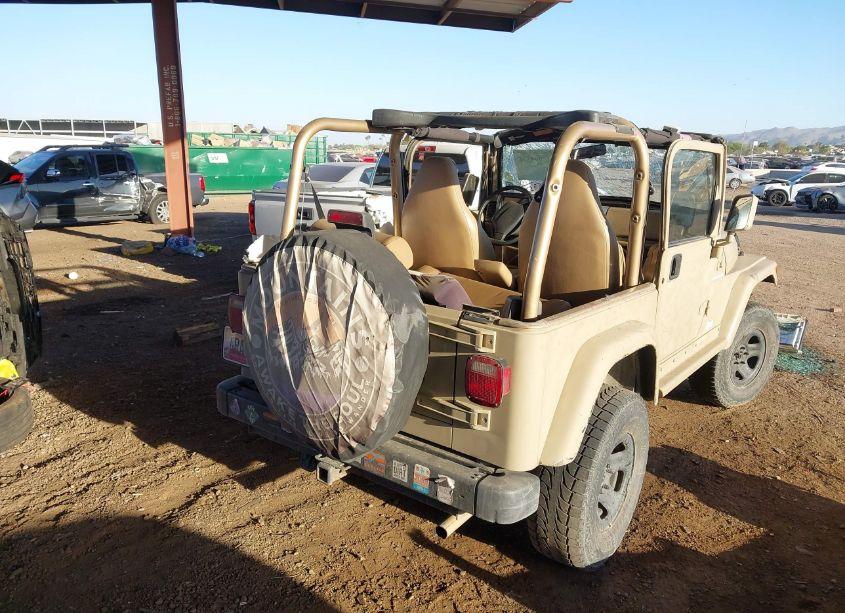 Photo 4 of 1999 Jeep Wrangler SE (VIN 1J4FY29P3XP422404)