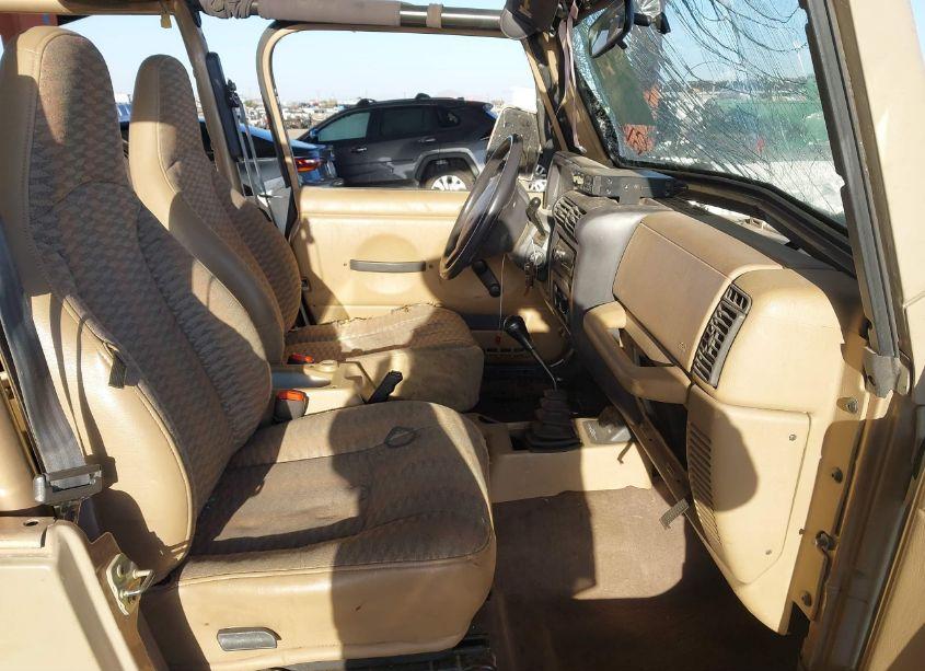 Photo 5 of 1999 Jeep Wrangler SE (VIN 1J4FY29P3XP422404)