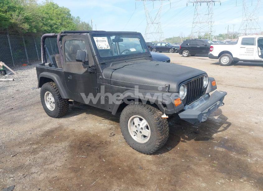 1999 Jeep Wrangler SE (VIN 1J4FY29P3XP469786) main photo