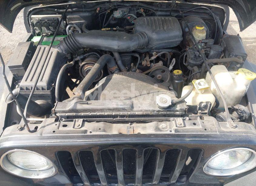 Photo 10 of 1999 Jeep Wrangler SE (VIN 1J4FY29P3XP469786)