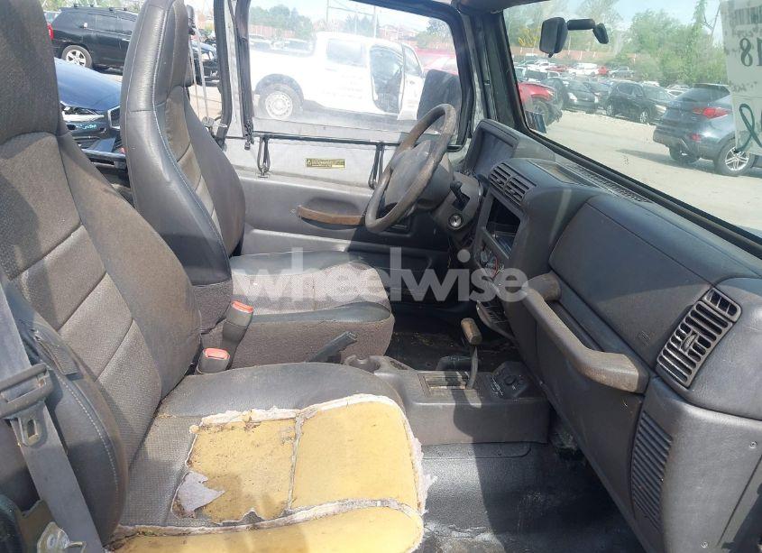 Photo 5 of 1999 Jeep Wrangler SE (VIN 1J4FY29P3XP469786)