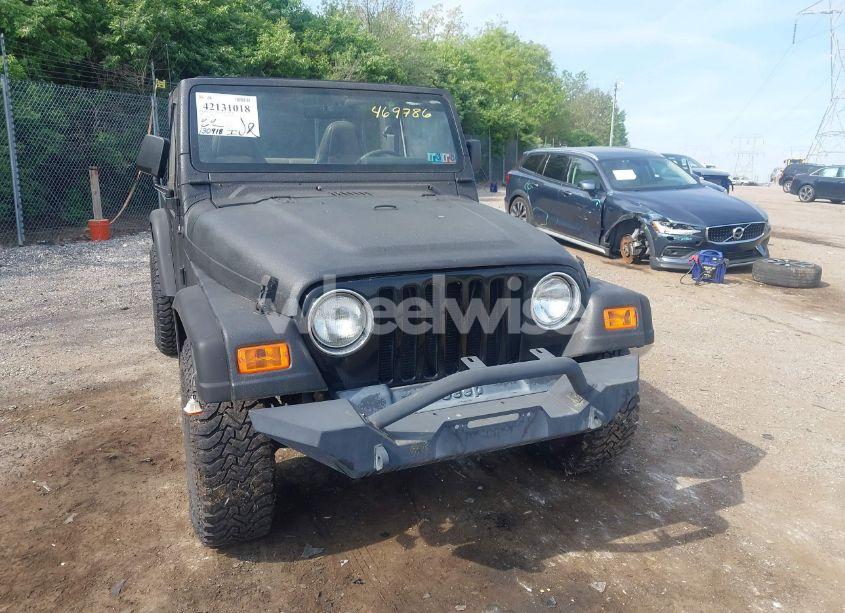 Photo 6 of 1999 Jeep Wrangler SE (VIN 1J4FY29P3XP469786)