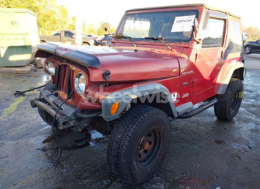 Photo 2 of 1999 Jeep Wrangler SE (VIN 1J4FY29P3XP485714)