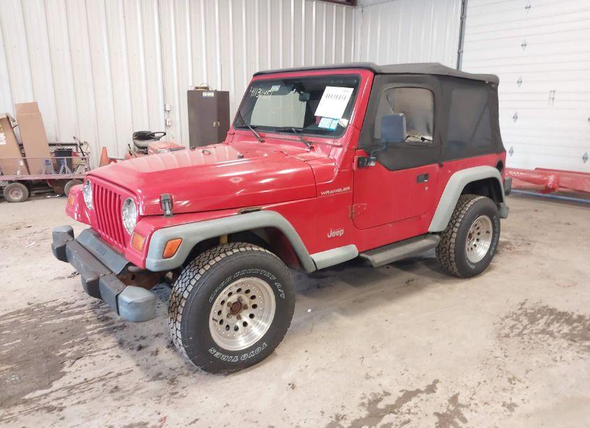 Photo 2 of 1999 Jeep Wrangler SE (VIN 1J4FY29P3XP487026)