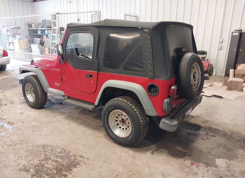 Photo 3 of 1999 Jeep Wrangler SE (VIN 1J4FY29P3XP487026)