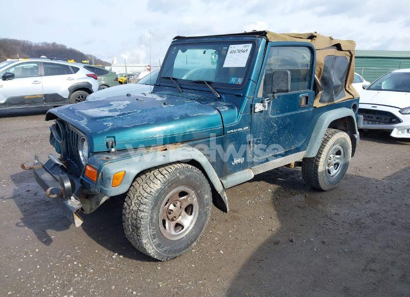 Photo 2 of 1997 Jeep Wrangler SE (VIN 1J4FY29P5VP497067)
