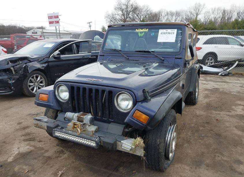Photo 2 of 1999 Jeep Wrangler SE (VIN 1J4FY29P5XP408195)