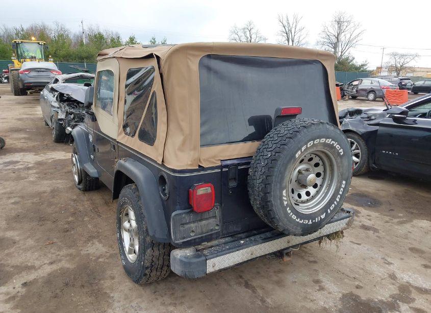 Photo 3 of 1999 Jeep Wrangler SE (VIN 1J4FY29P5XP408195)