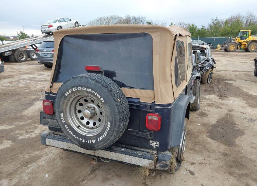 Photo 4 of 1999 Jeep Wrangler SE (VIN 1J4FY29P5XP408195)